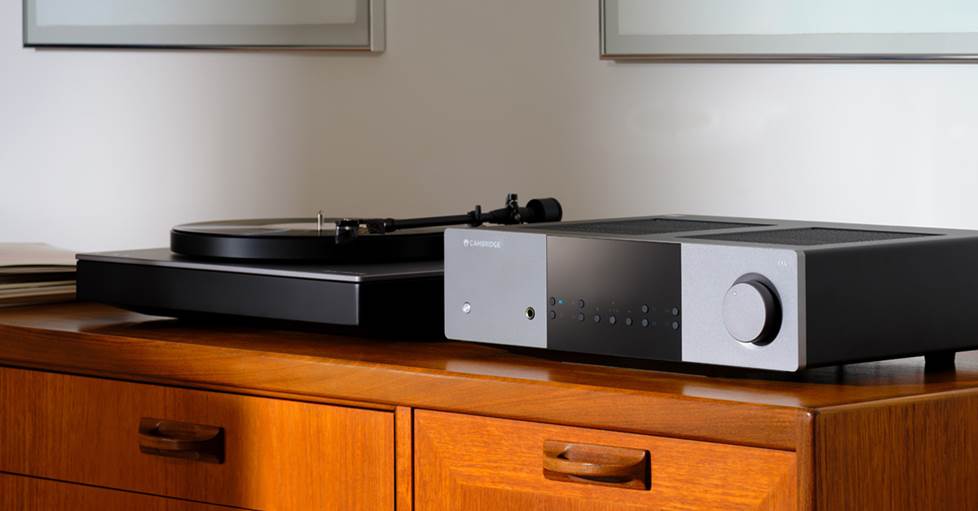 A turntable connected to an integrated amplifier